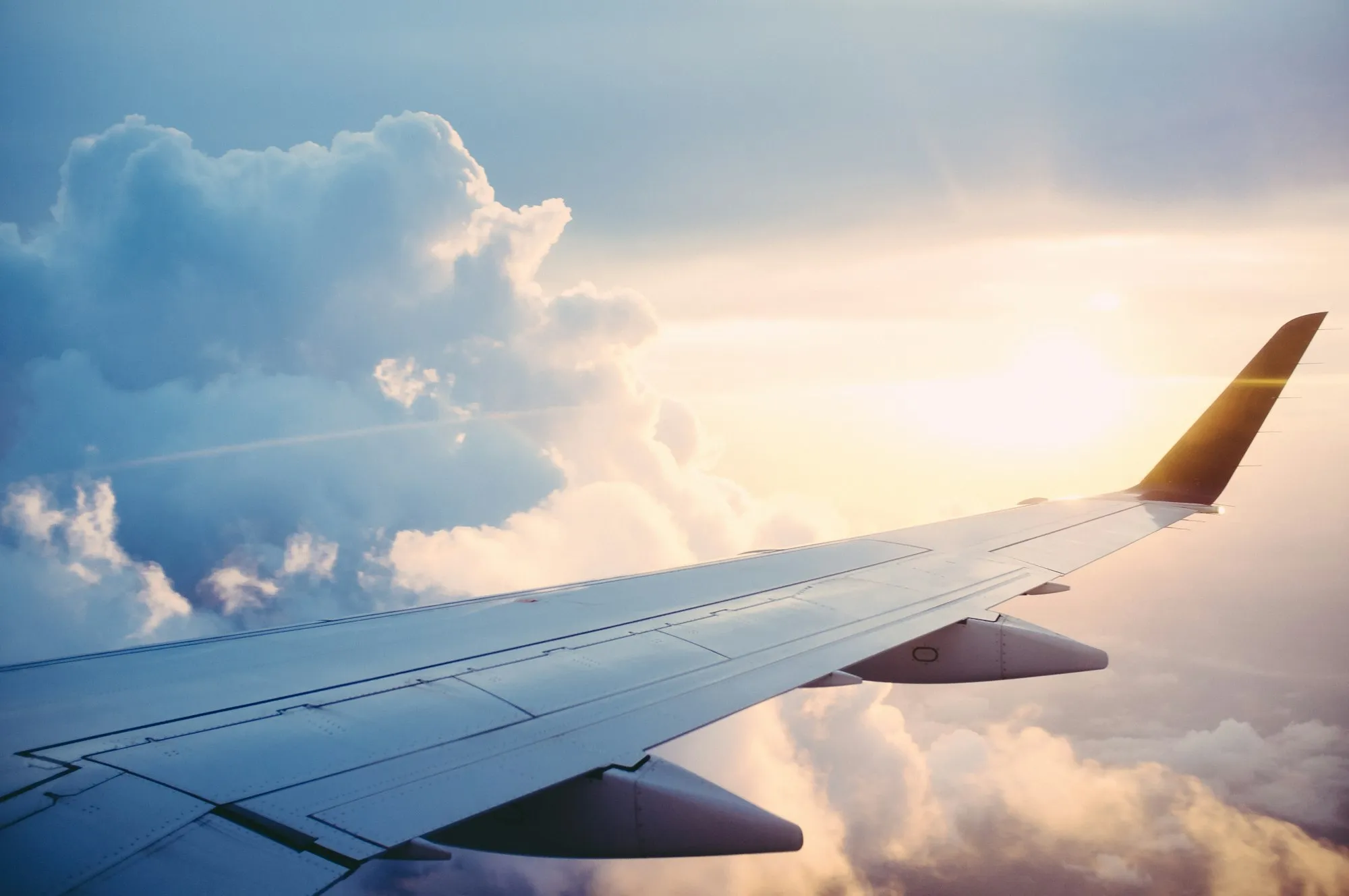 Aircraft wing at sunset