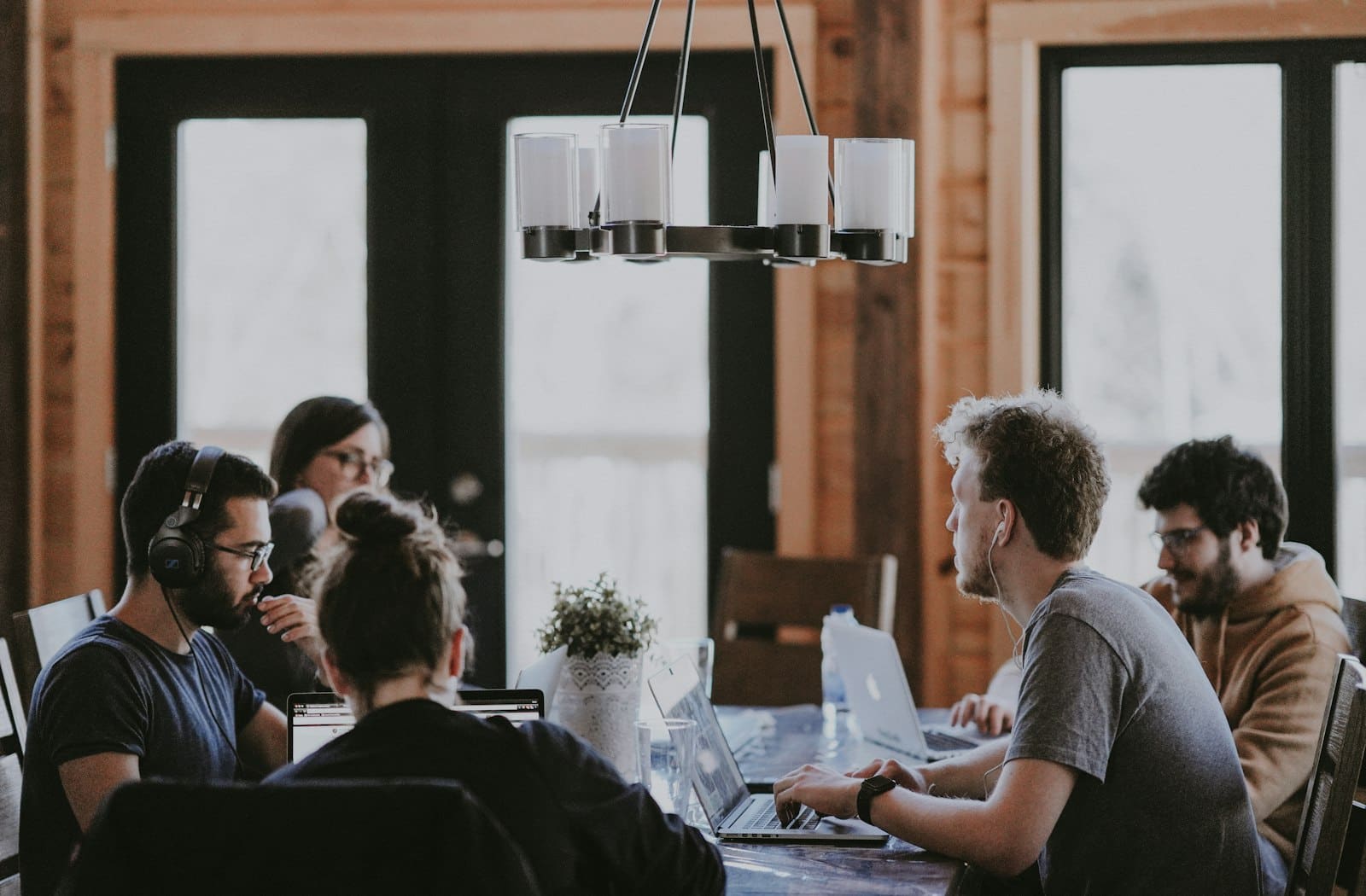 A project team gathering around a table to mobilise